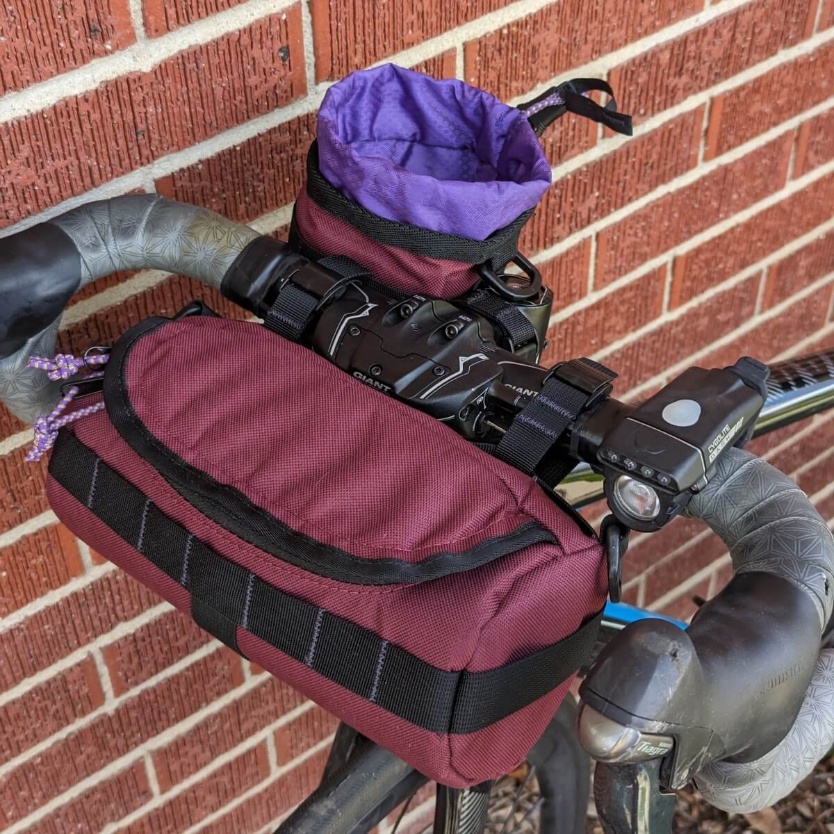 HandleStash burrito bag and stem bag on bike, color purple