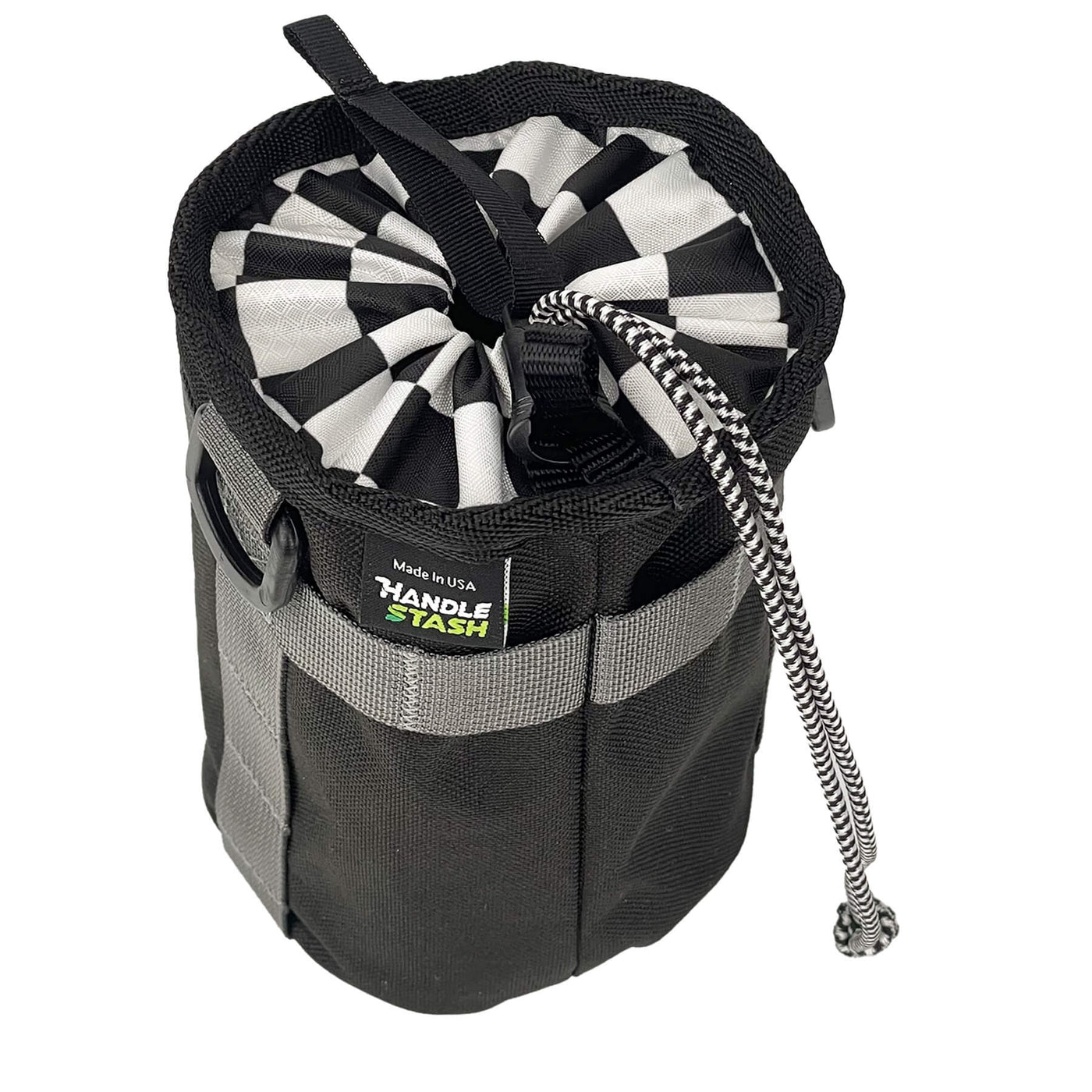 Black stem bag with two-tone liner cinched closed.