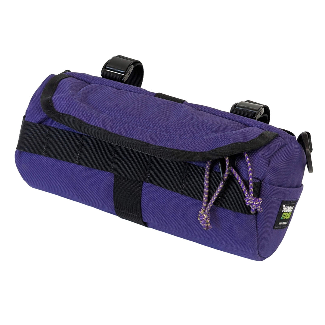 purple handlebar bag on white - front
