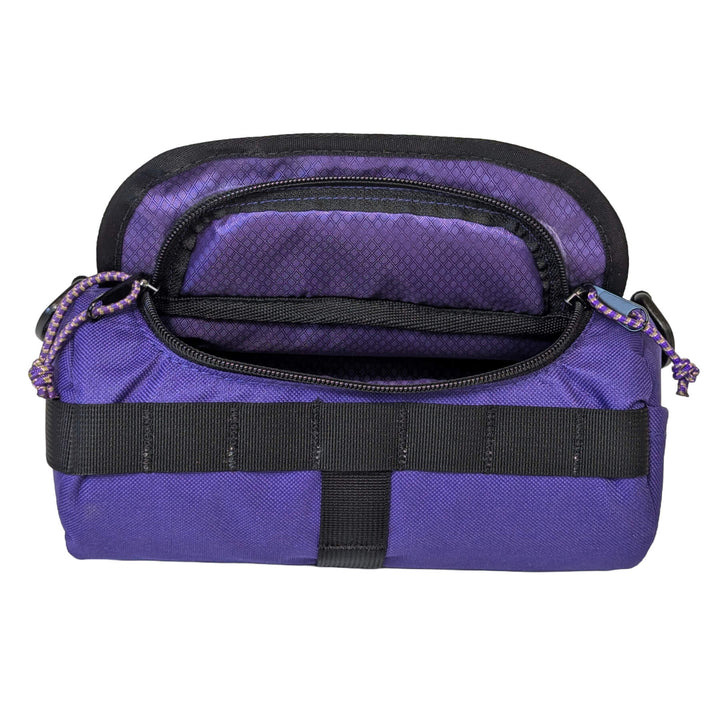 purple handlebar bag on white - open