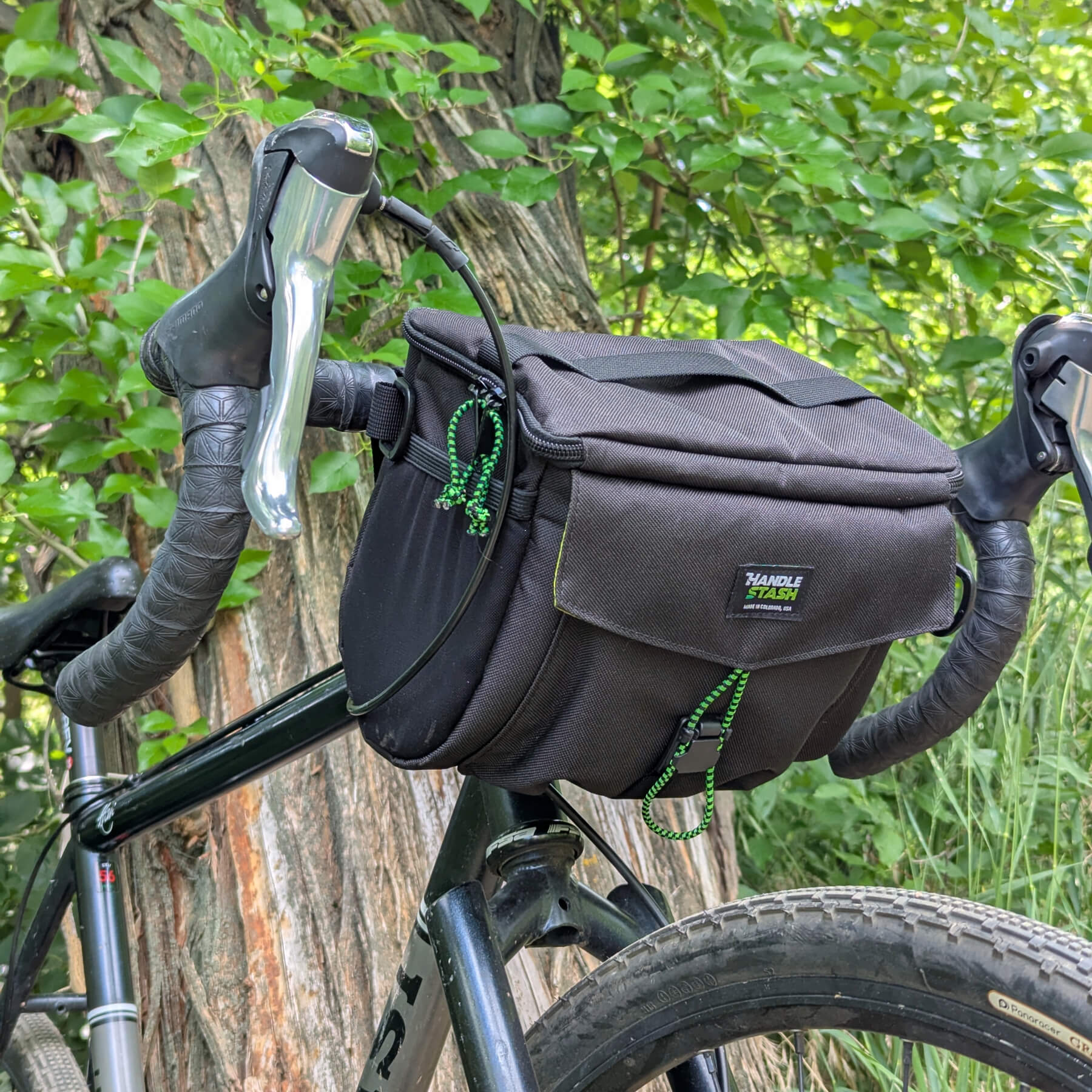 Black stashquatch bar bag on bike