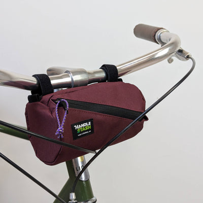 maroon Mini handlebar bag on bike