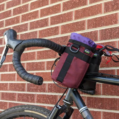 Double stem bags on bike. purple and red/black