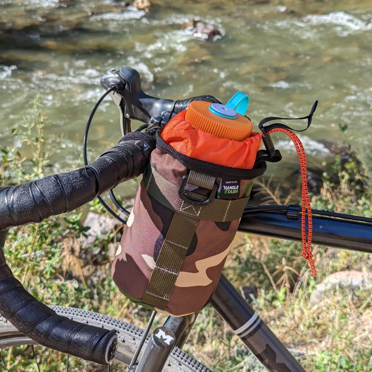 Camo bike stem bag with large water bottle