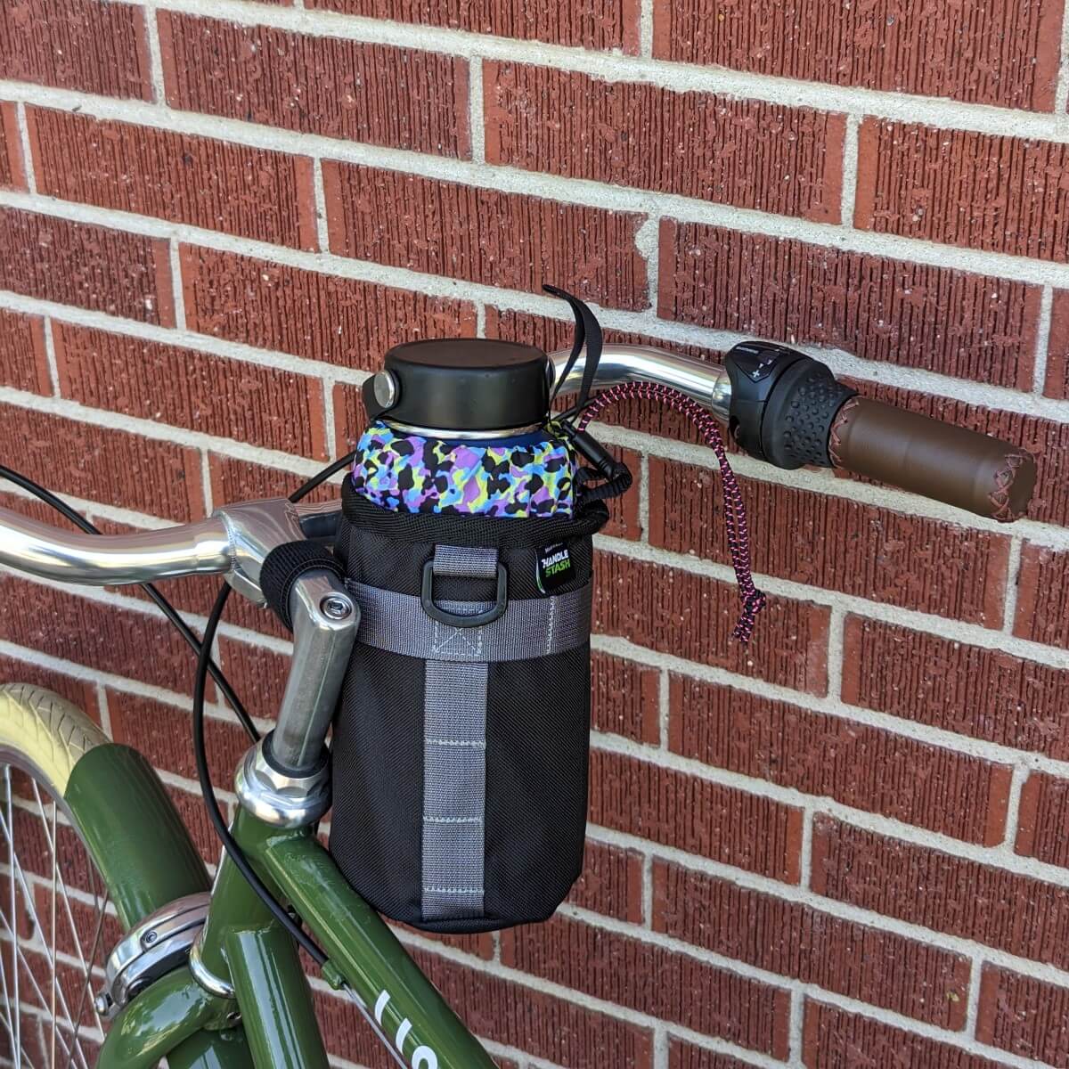 Black and party panther stem bag on bicycle. 