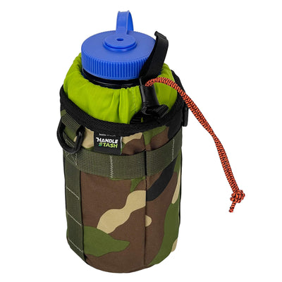 Camouflage bike stem bag with green liner angle view holding nalgene.