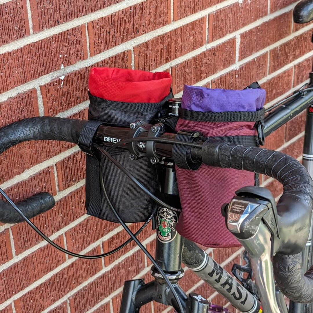 front view: two handlestash stem bags on bike