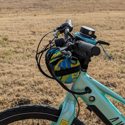 Floral handlebar bag on electric bike side view