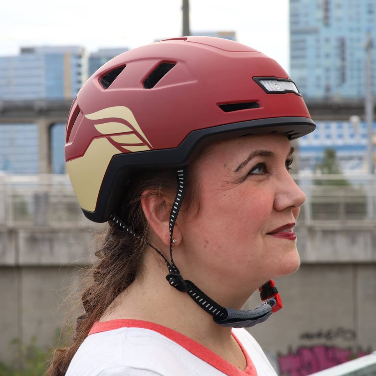 woman wearing xnito ebike helmet and plotting 