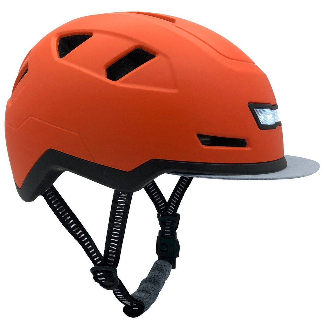 Orange helmet with black straps on a white background
