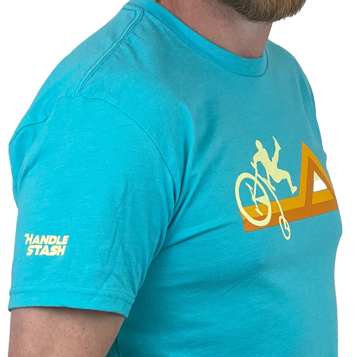 Mountain coast biking t shirt - zoomed in showing logo on sleeve. 