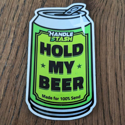 Sticker shaped like beer can with HOLD MY BEER printed in bold. 